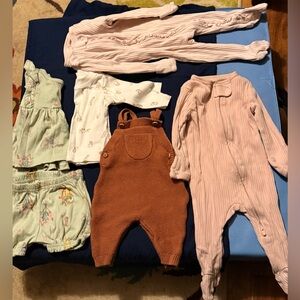 Lot of baby girls clothes Carters and H & M newborn x2 and 0-3 month sleepers x2